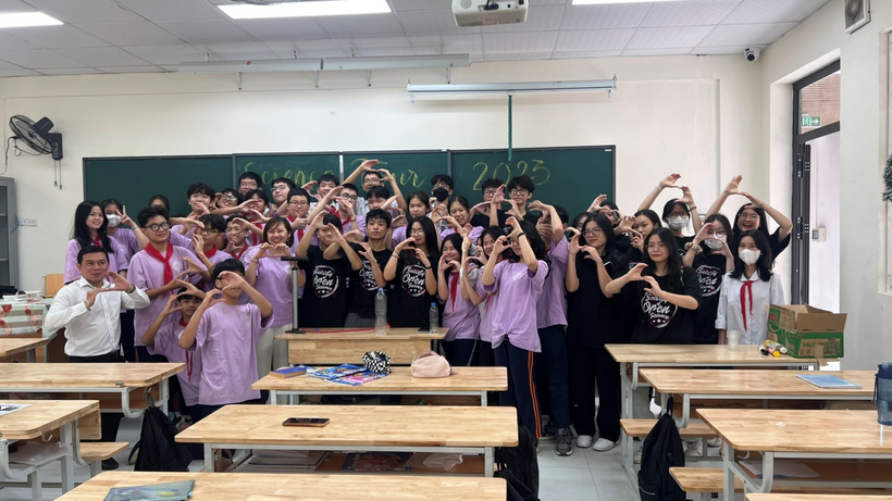 A group of people in a classroomDescription automatically generated