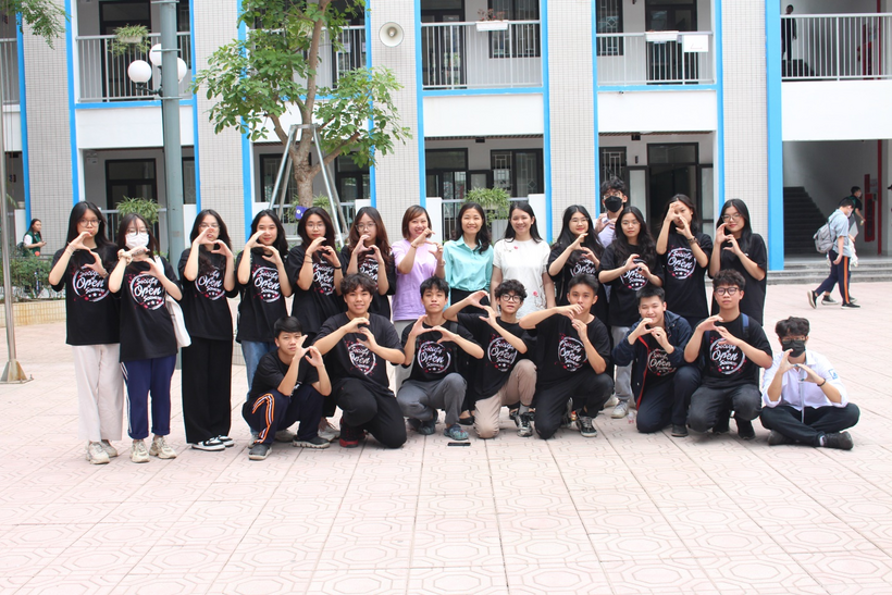 A group of people posing for a photoDescription automatically generated