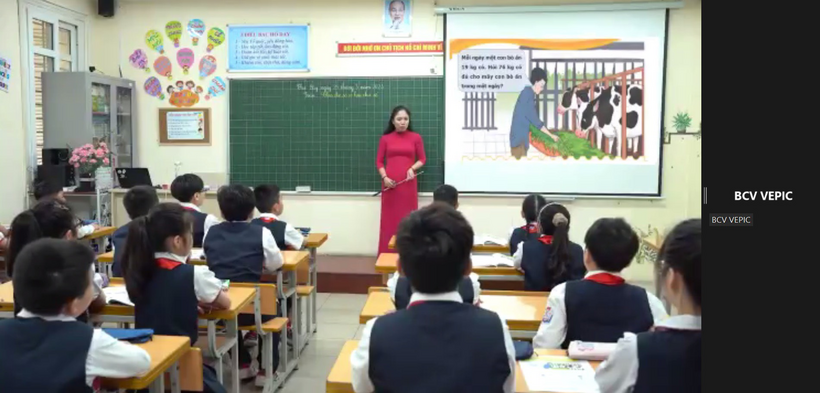 A person standing in front of a classroomDescription automatically generated