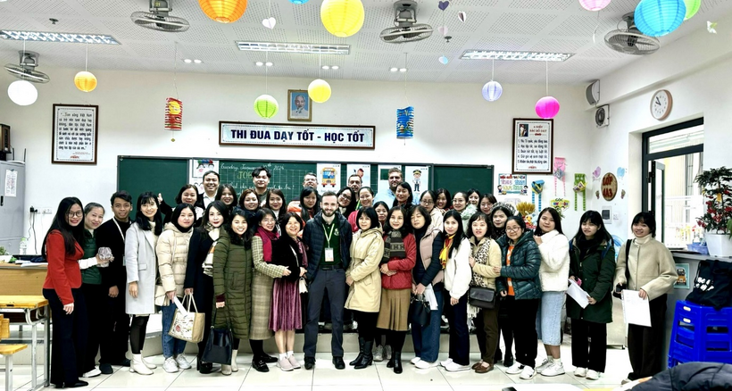 A group of people posing for a photoDescription automatically generated