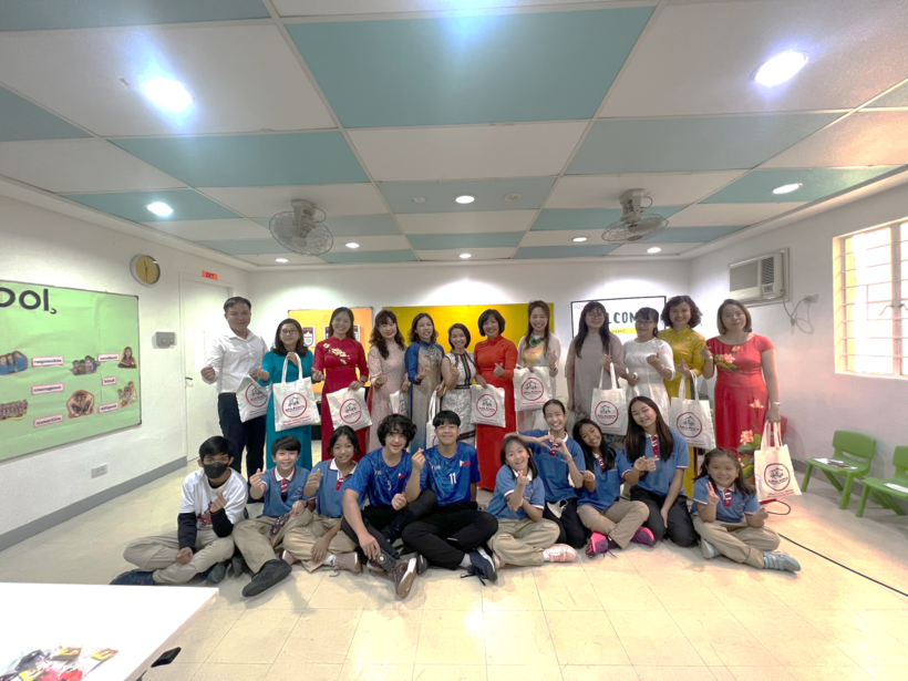 A group of people posing for a photoDescription automatically generated
